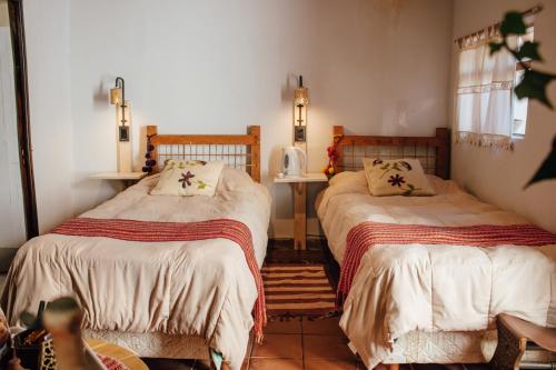 Ένα ή περισσότερα κρεβάτια σε δωμάτιο στο Casa de la Flia. Sánchez