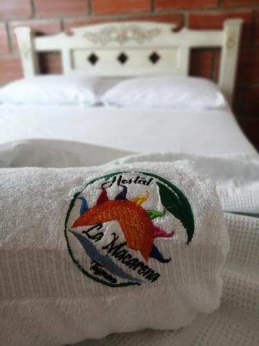 a close up of a towel on a bed at HOSTAL LA MACARENA in El Zaino