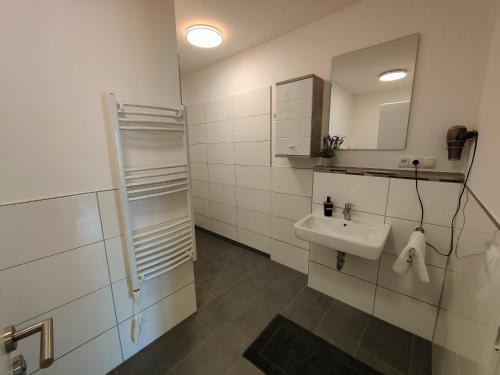 Koupelna v ubytování Ferienwohnung in Lütjenburg/Ostsee zu vermieten