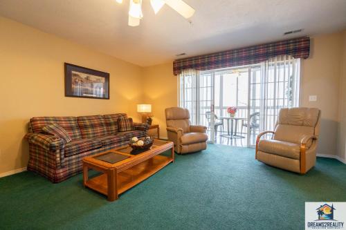 a living room with a couch and chairs and a table at 2BR Walk-In Condo - Near The Strip - FREE TICKETS INCLUDED - CH1-18 in Branson