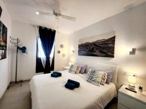 A bed or beds in a room at El ron ron de Fuerte
