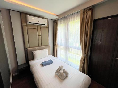 Postel nebo postele na pokoji v ubytování Luxury sea view apartment at Panora by Lofty