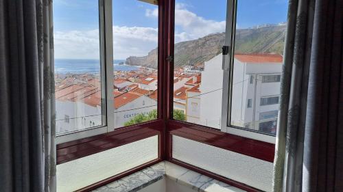 a view from a window of a city at APT Nazaré in Nazaré