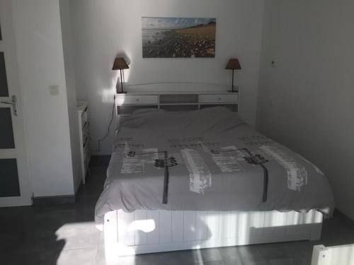 Posteľ alebo postele v izbe v ubytovaní Maison de plage de la Pentie