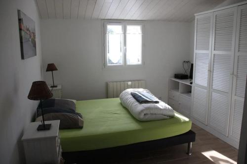 Posteľ alebo postele v izbe v ubytovaní Maison de plage de la Pentie