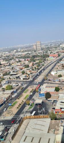 an aerial view of a city with a highway at PYB Souper Deptos in Santiago