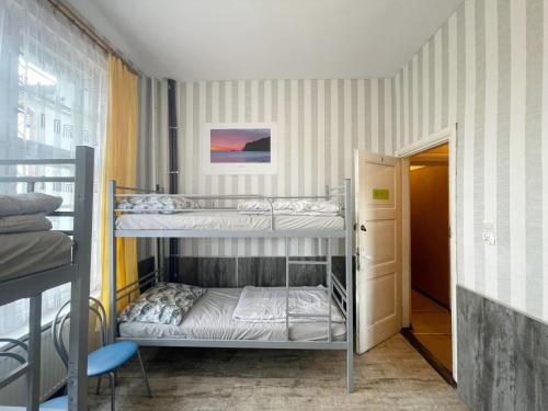 BP Hostel Gdyniaにあるベッド