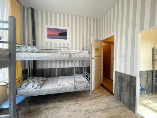 BP Hostel Gdyniaにあるベッド