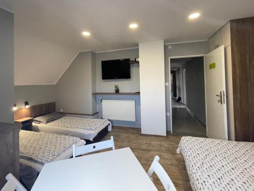 BP Hostel Gdyniaにあるテレビまたはエンターテインメントセンター