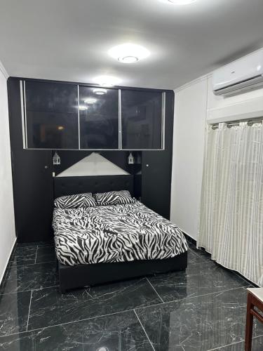 Posteľ alebo postele v izbe v ubytovaní Moderne appartement Cannes