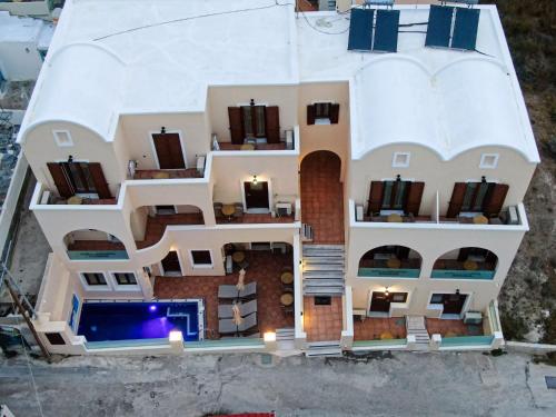 an aerial view of a house with a model at Antonia Apartments in Fira