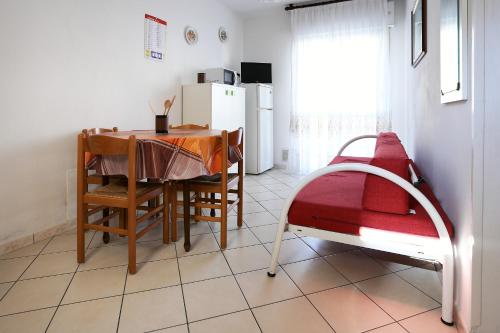 Postel nebo postele na pokoji v ubytování Residence La Pigna