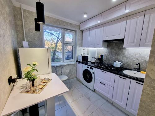 Cuina o zona de cuina de Люкс в центре