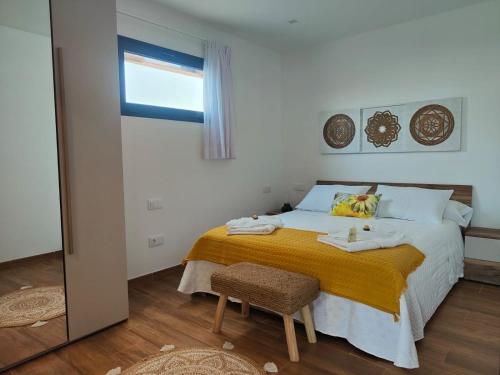 Postel nebo postele na pokoji v ubytování Villa Jardín Atteneri