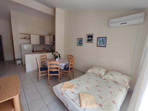 a living room with a couch and a table at Keran 4 in Podgora