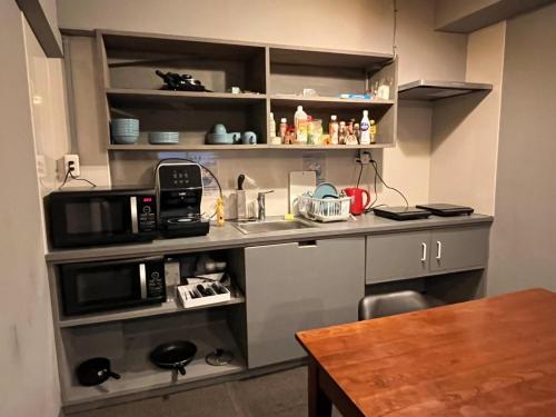 Kuchyň nebo kuchyňský kout v ubytování Rhodes Otsuka Hotel