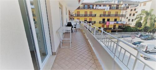 a balcony with a view of a city at Zefiro Holiday Home in Agropoli