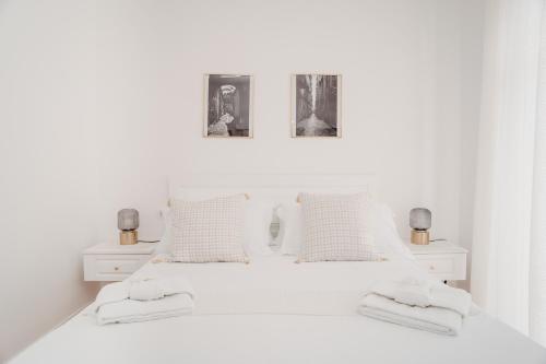 Кровать или кровати в номере Vista Napoli Residence by Casa Napoletana