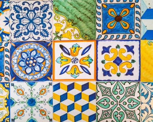 a group of colorful tiles with different designs on them at Hotel & Spa Relais Freedom Club in Massa Lubrense