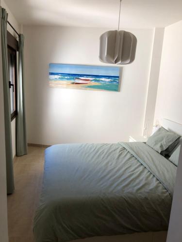 Säng eller sängar i ett rum på Nuri Palomares