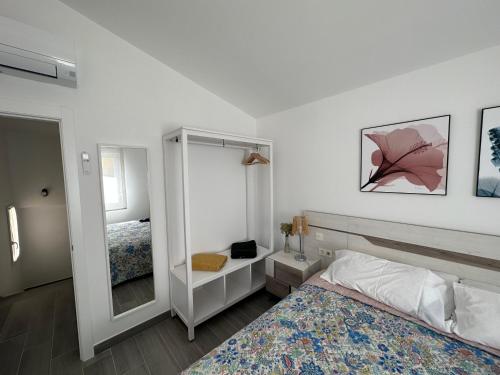 Ένα ή περισσότερα κρεβάτια σε δωμάτιο στο DUPLEX La OLMA