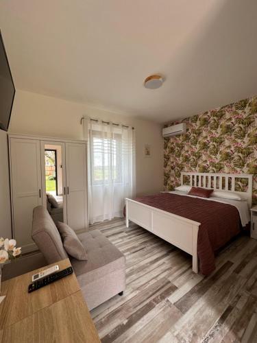 Postel nebo postele na pokoji v ubytování B&B Dimora delle Ninfee