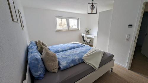 Katil atau katil-katil dalam bilik di Moderne gemütliche Ferienwohnung in Friedrichshafen