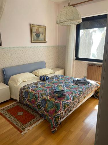Posteľ alebo postele v izbe v ubytovaní Villa Lilli