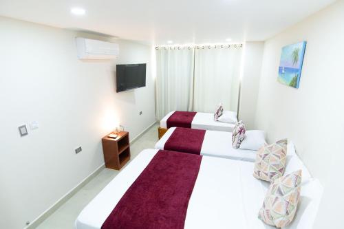 Katil atau katil-katil dalam bilik di Hotel Sierra Nevada