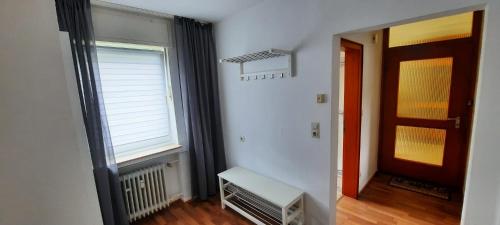 a room with a door and a window and a window at Pension Schneider in Cochem