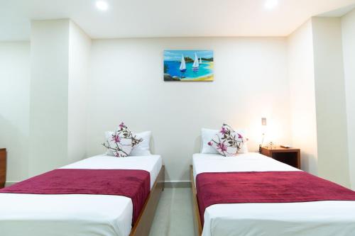 Katil atau katil-katil dalam bilik di Hotel Sierra Nevada