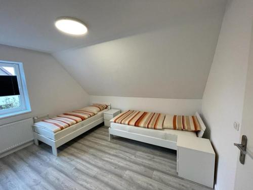 Postel nebo postele na pokoji v ubytování MM Apartment