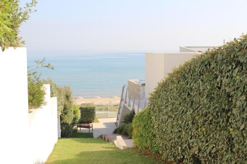 a stairway leading to a building with the ocean in the background at Dimore di Mare in Termoli