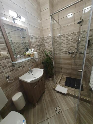 Ένα μπάνιο στο Harmony apartments