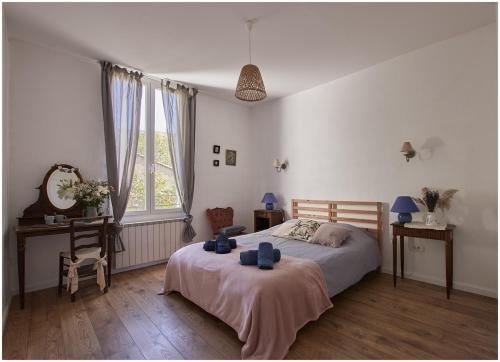 a bedroom with a bed and a large window at 1001 Ocres in Apt
