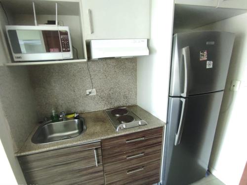 Kuchyň nebo kuchyňský kout v ubytování Ecusuites Family Riverfront 1 Best View Santa Ana Airport