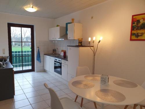 Kuchyň nebo kuchyňský kout v ubytování Ferienwohnung mit Charme