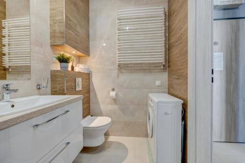 Et badeværelse på LM APARTAMENTY PODGÓRNA Stare Miasto