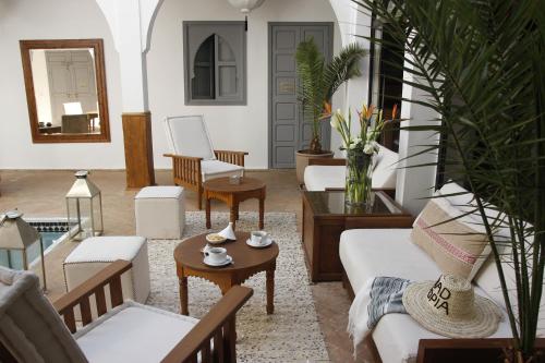 Posezení v ubytování Riad Utopia Suites And Spa