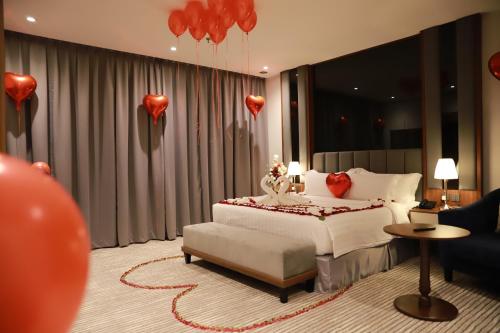 Katil atau katil-katil dalam bilik di Tulip View Hotel