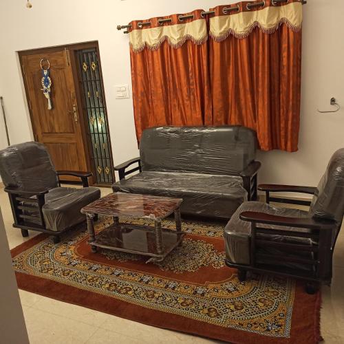 Χώρος καθιστικού στο REHMANS HOMESTAY