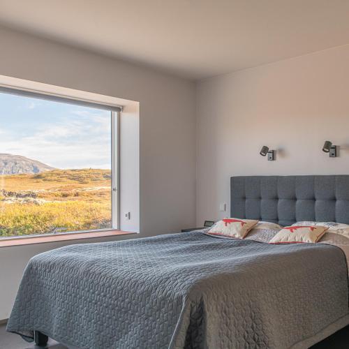 Postel nebo postele na pokoji v ubytování Tranquil resort with great views