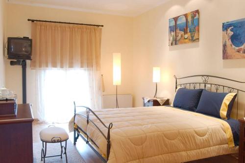 Ένα ή περισσότερα κρεβάτια σε δωμάτιο στο Privilege Villas