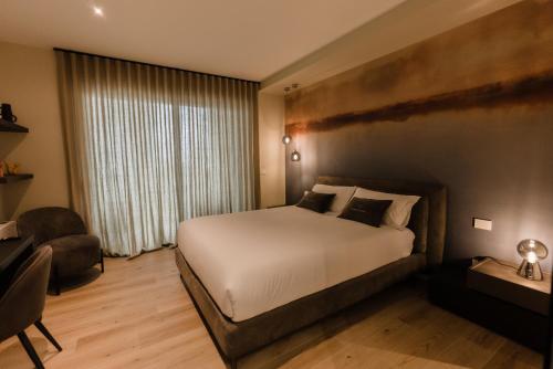 Postelja oz. postelje v sobi nastanitve 'Tabula Rasa Exclusive Rooms'
