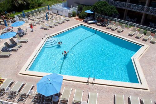 an overhead view of a swimming pool at a hotel at The Beach Club at St. Augustine in Saint Augustine Beach