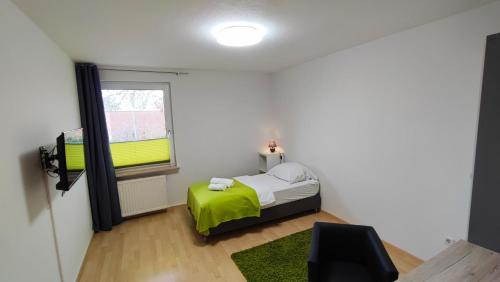 Cama o camas de una habitación en Zimmervermietung38 - Nebel
