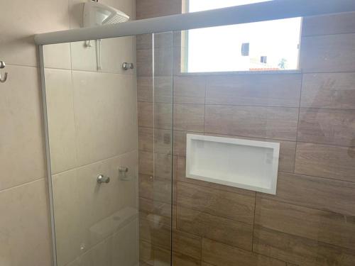 Koupelna v ubytování Casa 4 suítes com piscina Condomínio Lagoa Dourada Ilha de Itaparica BA