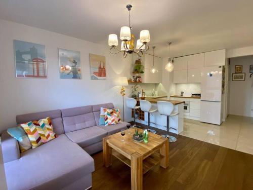 White and Bright Riverside View Flat with Parking, Bike Access, and Onsite Gym