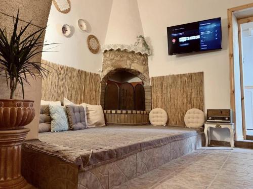 Postel nebo postele na pokoji v ubytování Rustic House Archangelos