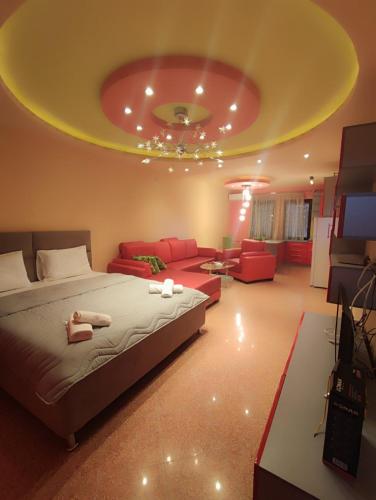 Ένα ή περισσότερα κρεβάτια σε δωμάτιο στο Gogo Apartments